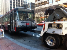 SF Muni bus towed